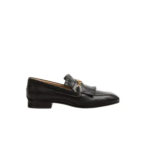 MOCCASINS WITH GOLD V LOGO SIGNATURE AND FRINGES.